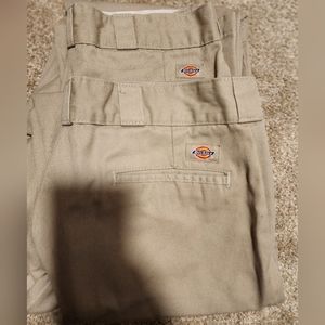 Two pairs of men's dickies. Good condition. No stains/rips. Size 36x34